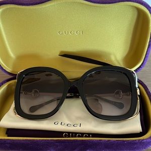 Gucci sunglasses.